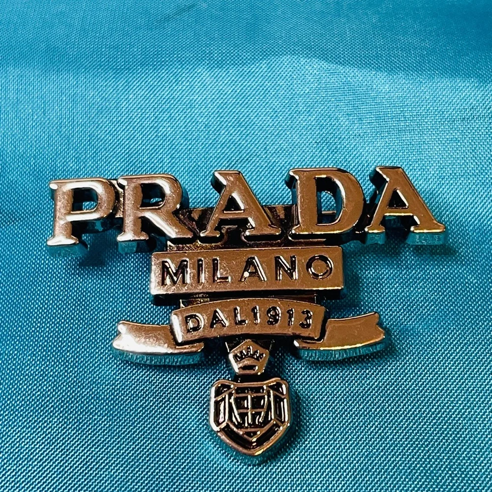 Prada Brooch Silver Logo Emblem Pin NIB