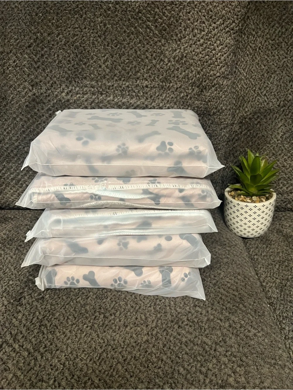 5 NWOT Puppy Pads in Light tan with Black Paw & Bone Print