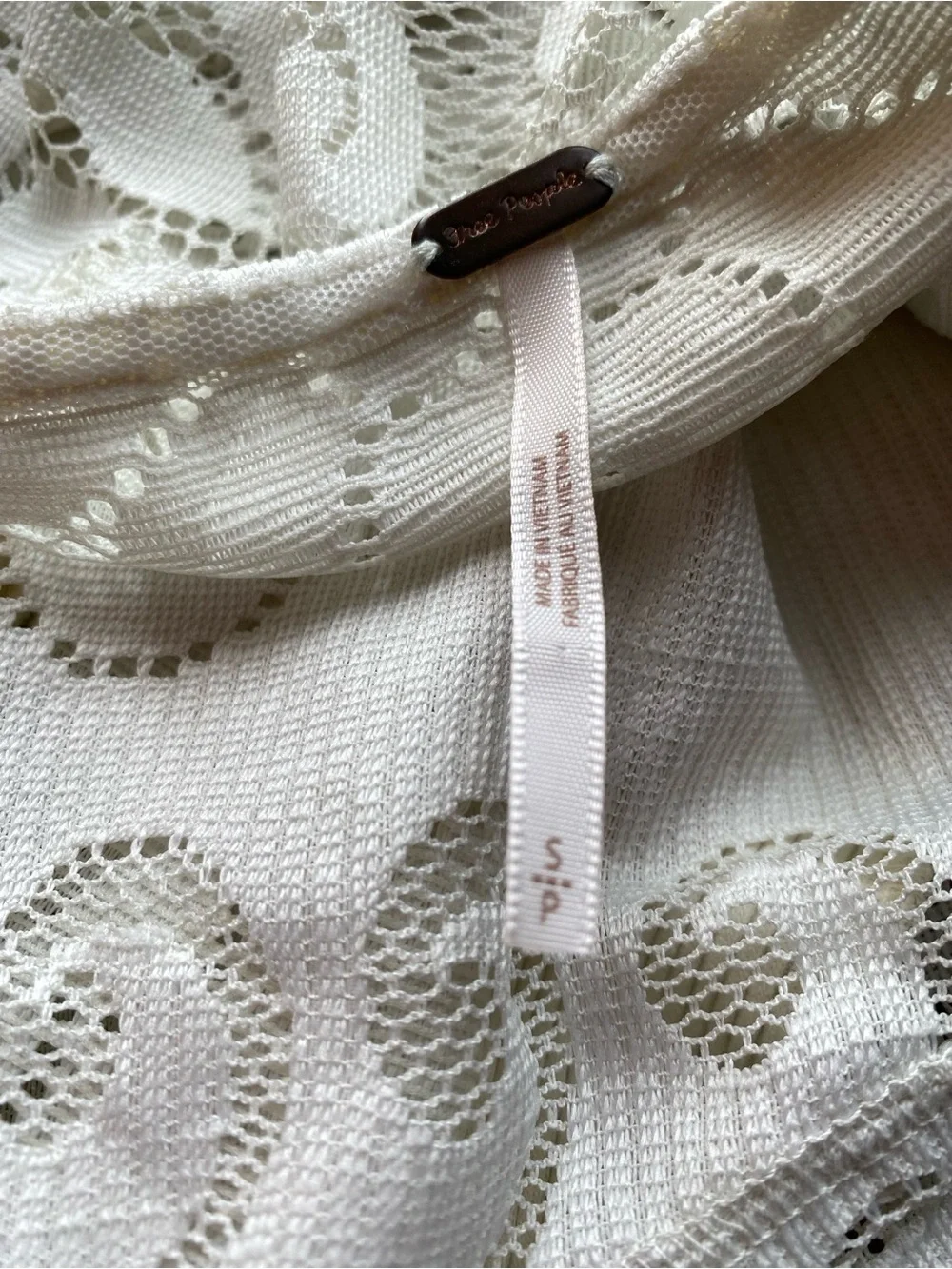 Free People intricate sleeves