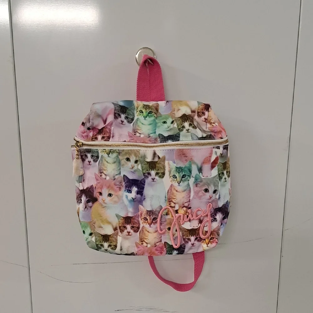 Juicy Couture features cat