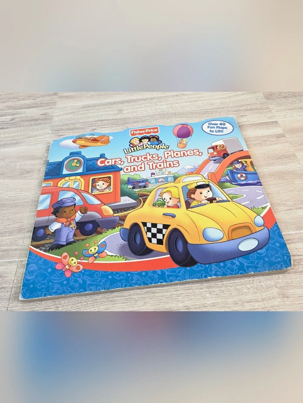 Fisher-Price Little People Cars, Trucks, Planes, and Trains Lift-the-Flap Book