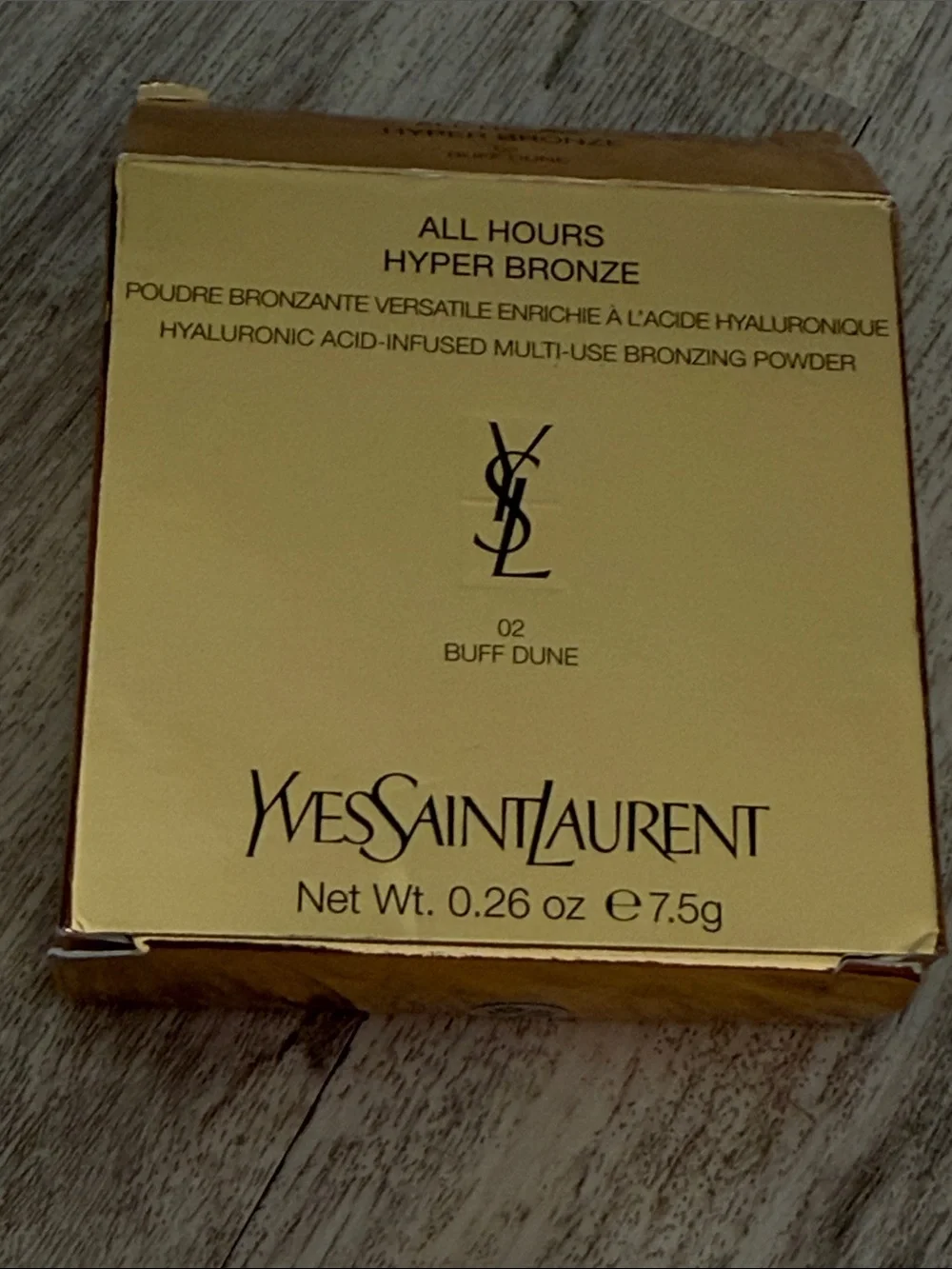 Yves Saint Laurent embossed pressed