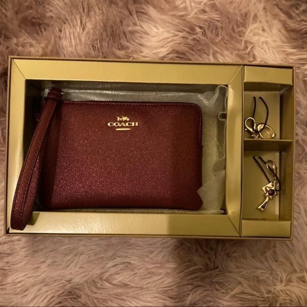 Coach Black Cherry Gift Set with Wristlet and two charms NWT