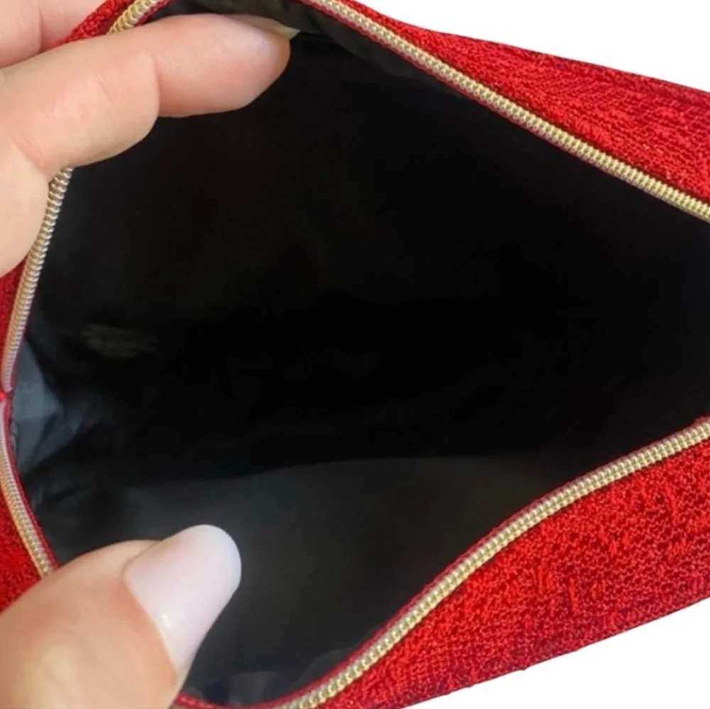 CHANEL Red Tweed Textured Pouch with Gold Accents