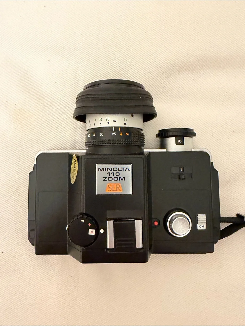 Vintage Minolta 110 Zoom SLR with Leather Bag and Strap