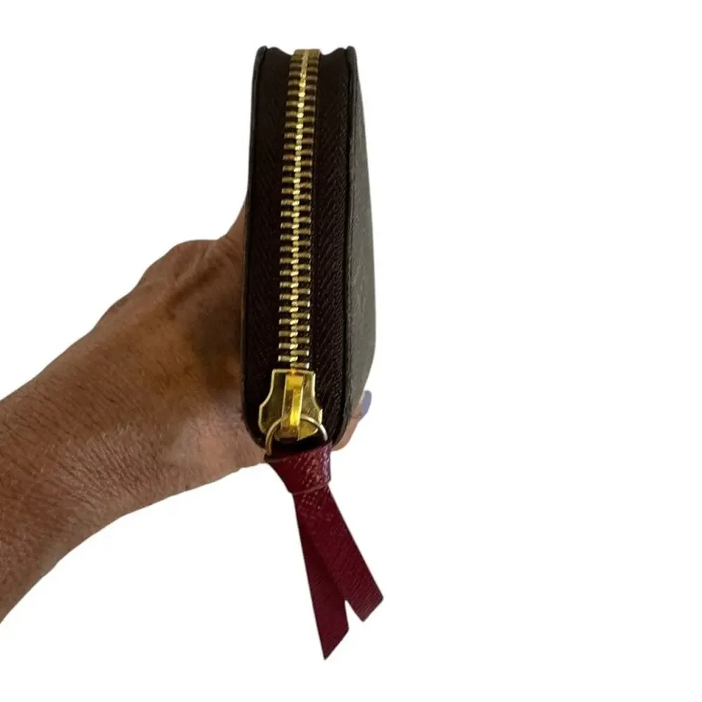 Louis Vuitton Zippy Wallet Monogram and Red Interior Gold Hardware Zipper Close