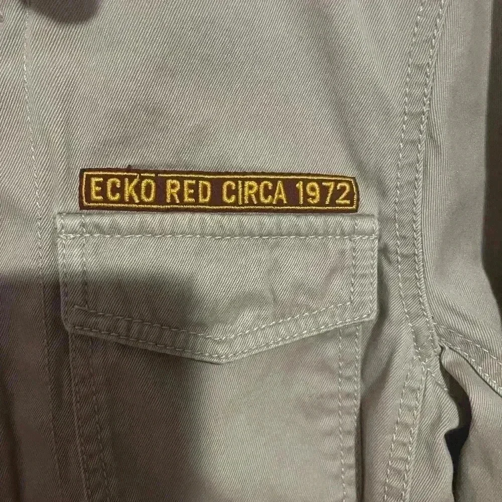 Marc Ecko y2k tan