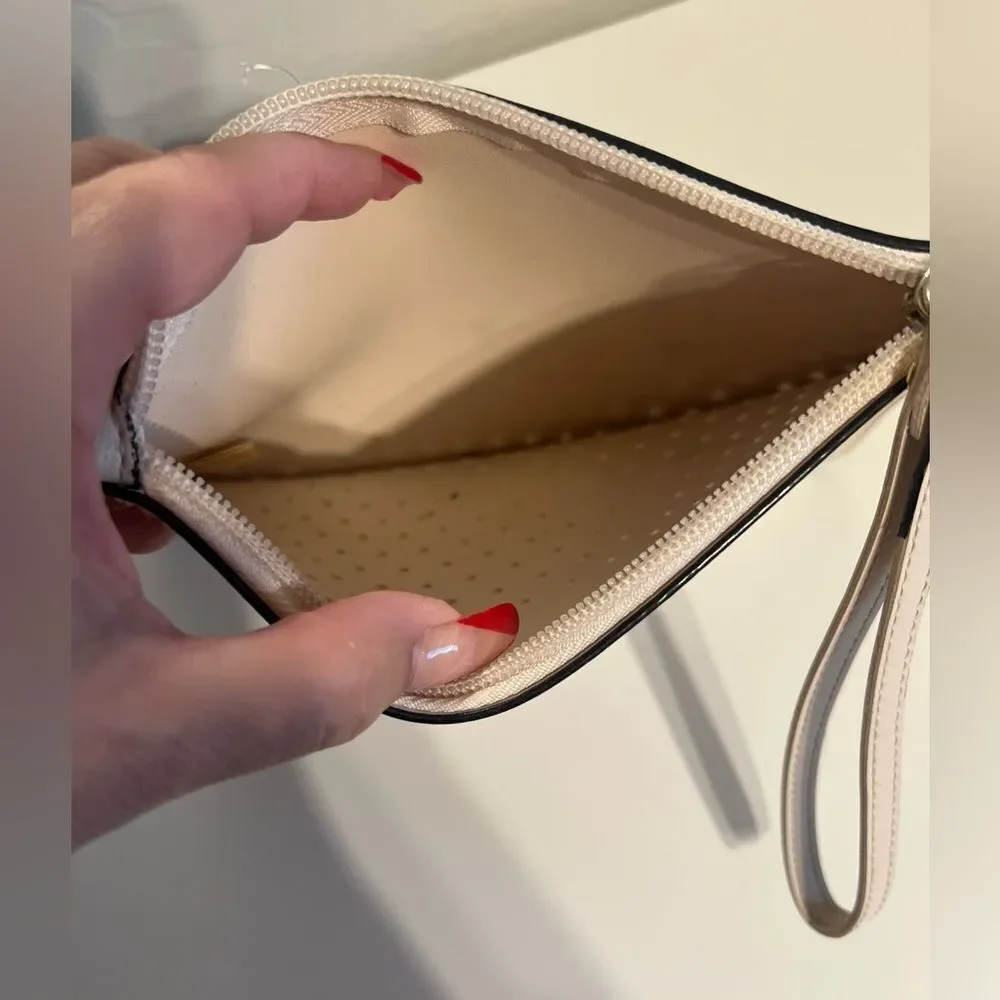 🛍️ Victoria's Secret Cream pinkish cut out Perforated zip Wristlet medium