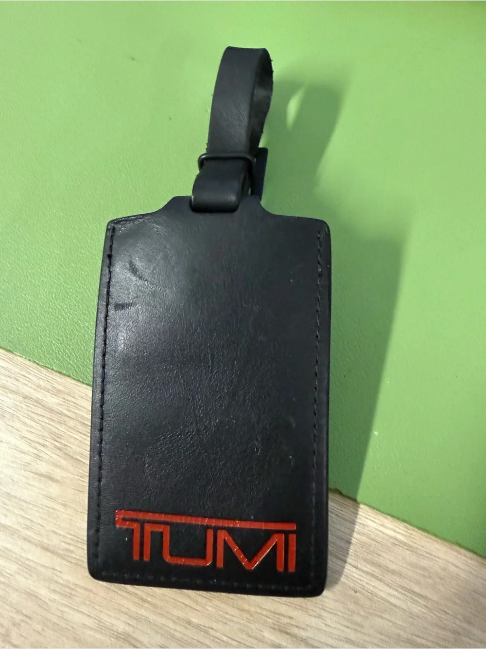 Tumi Black Leather Luggage Tag with Orange Logo