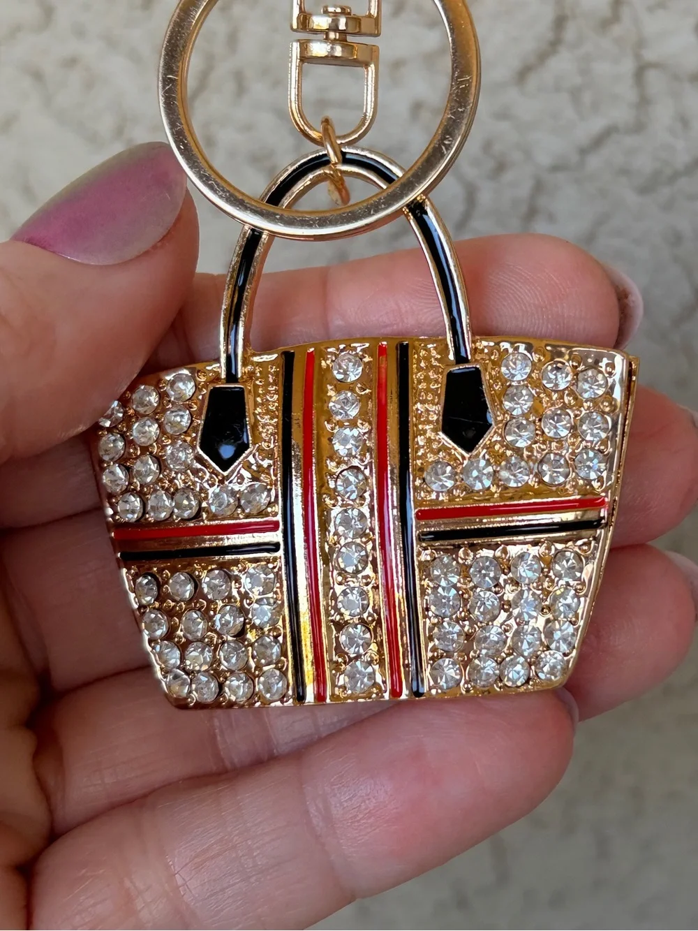 Sparkling Gold Crystal Tote Bag Keychain with Red & Black Stripes