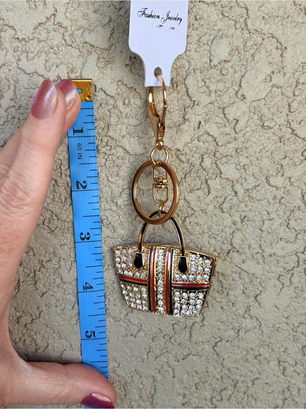 Sparkling Gold Crystal Tote Bag Keychain with Red & Black Stripes