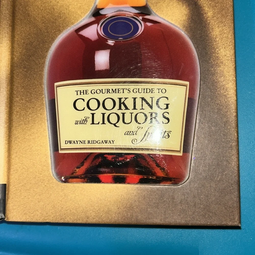Two cookbooks cooking with wine and cooking with liquors