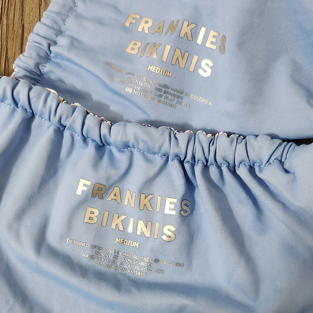 Frankies Bikinis enjoy sun