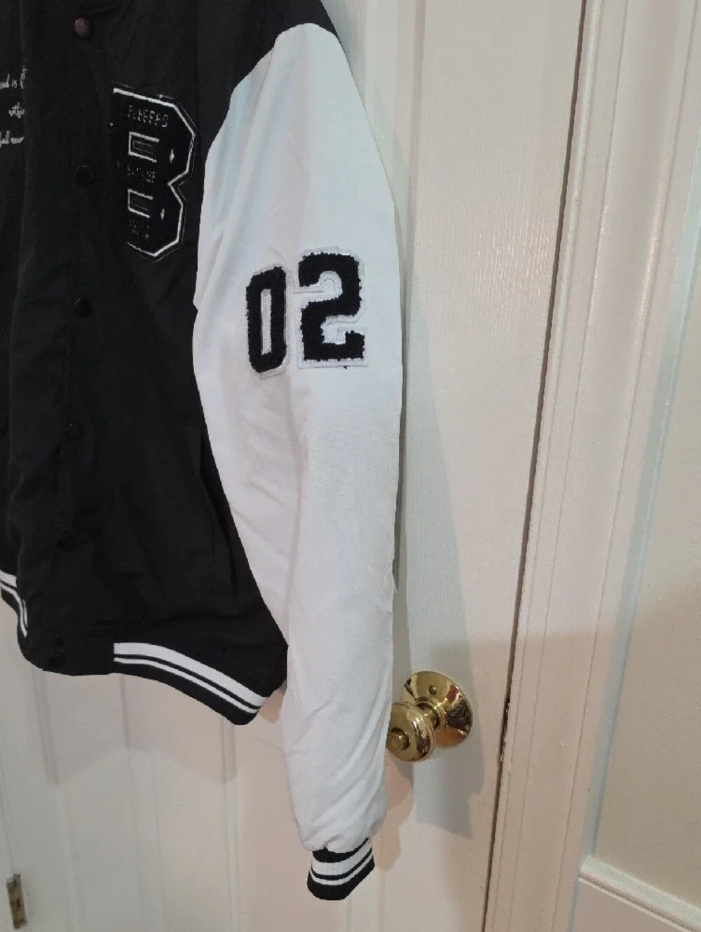 Seven Souls black varsity