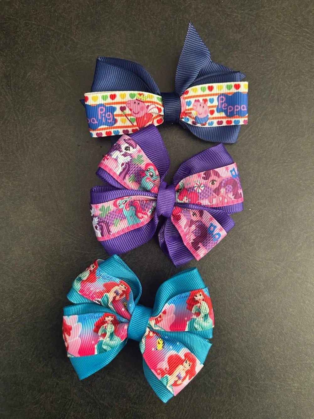 Character-themed hair bows for little girls