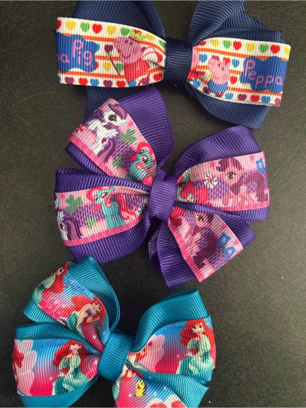 Character-themed hair bows for little girls