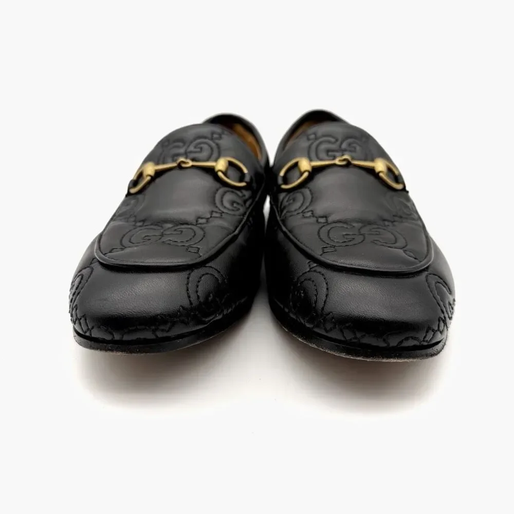 Gucci black embossed