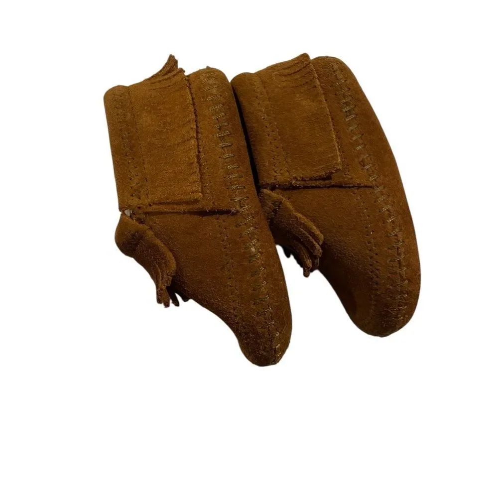 Minnetonka Tan  Moccasins with Fringe size 4