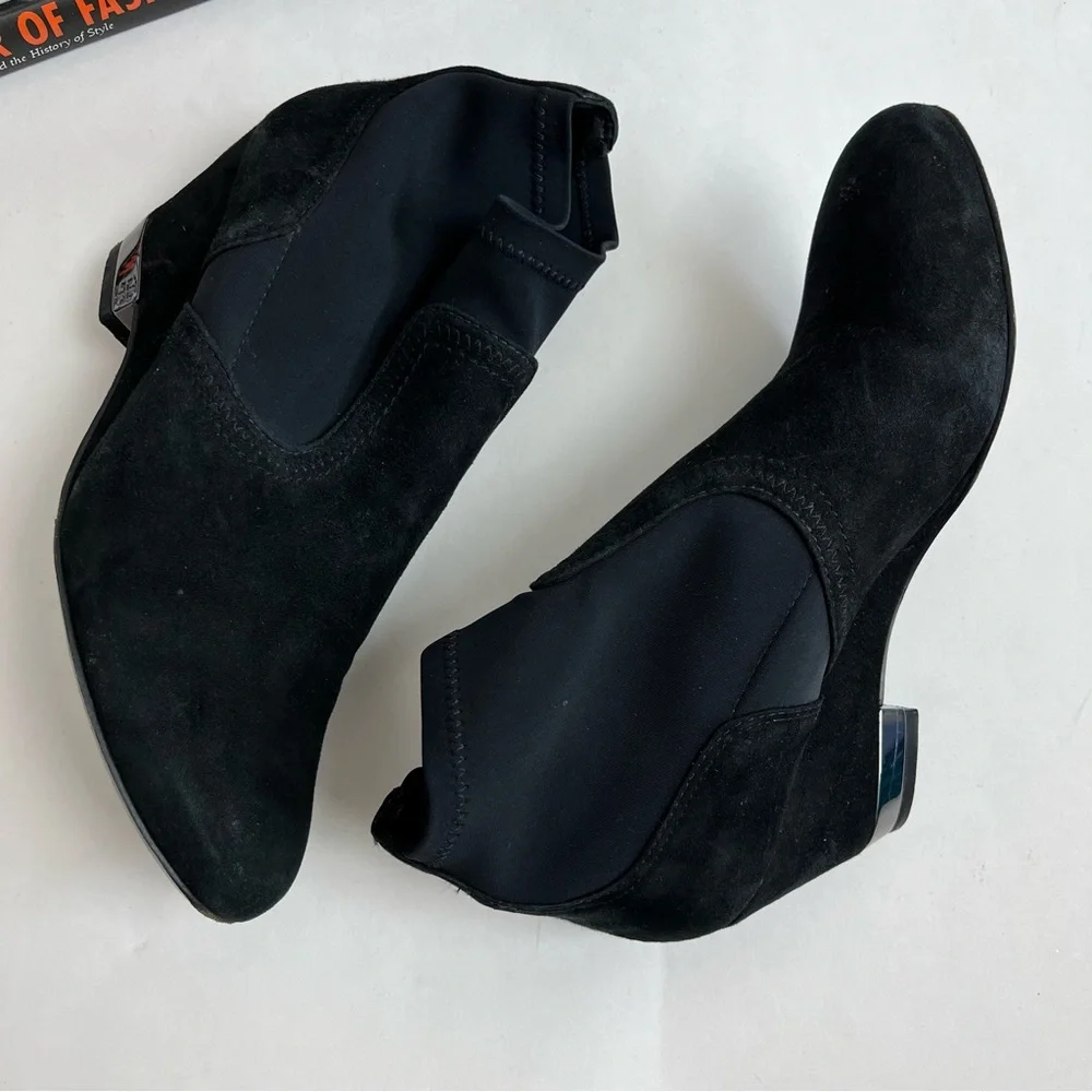 Tory Burch boots designer material