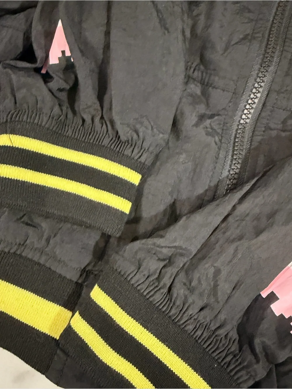 Justice Black Mini Bomber Jacket with Yellow Pac-Man Accents