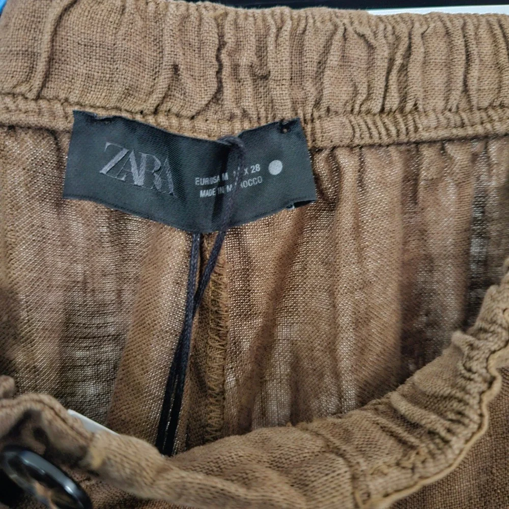 Zara brown wear holes