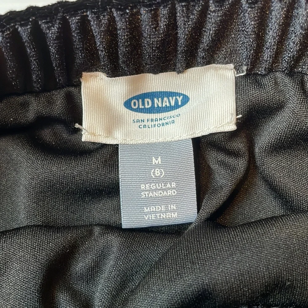 Old Navy gold and black short skirt.  Girl’s size 8
