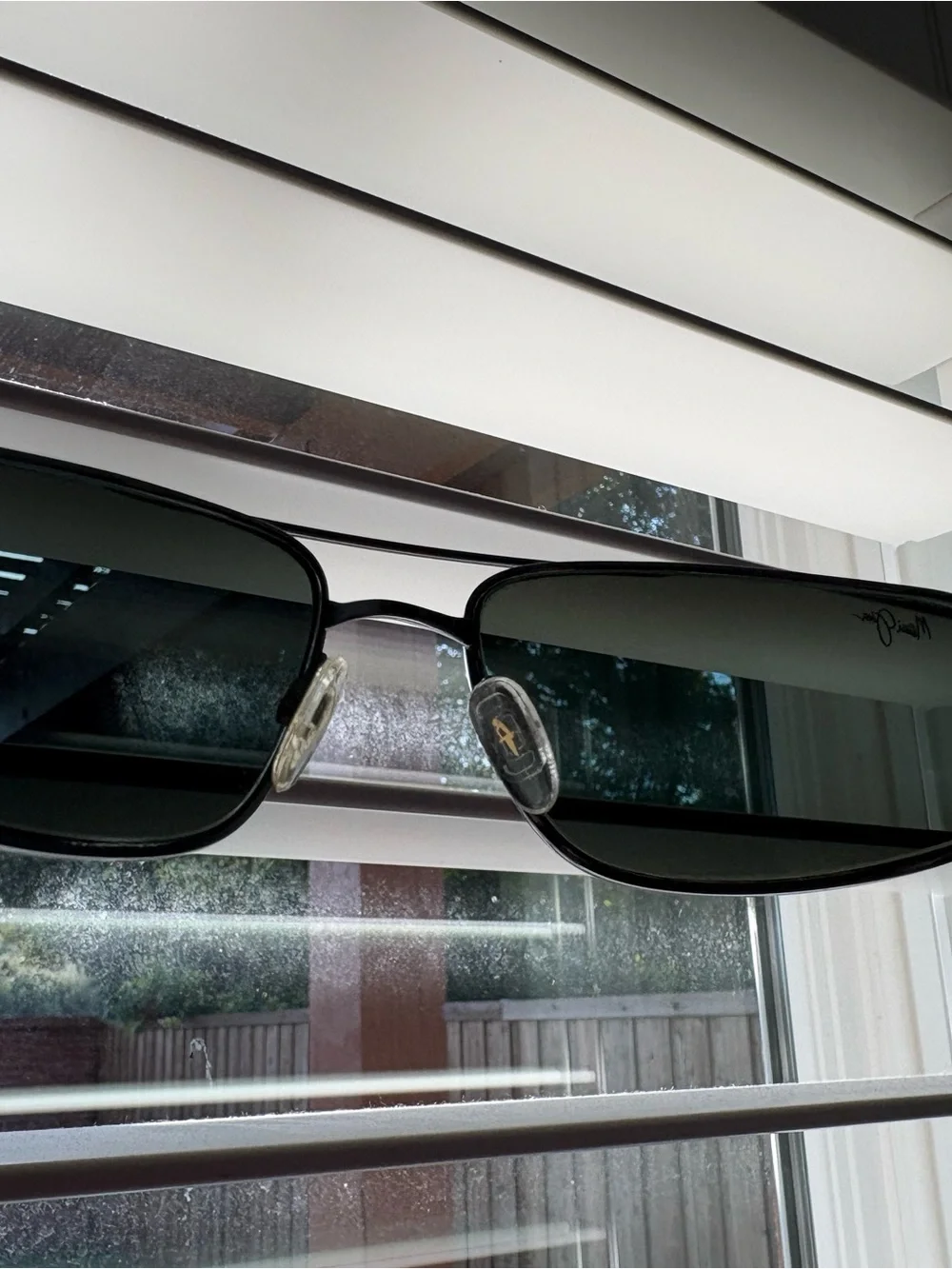 Maui Jim green as