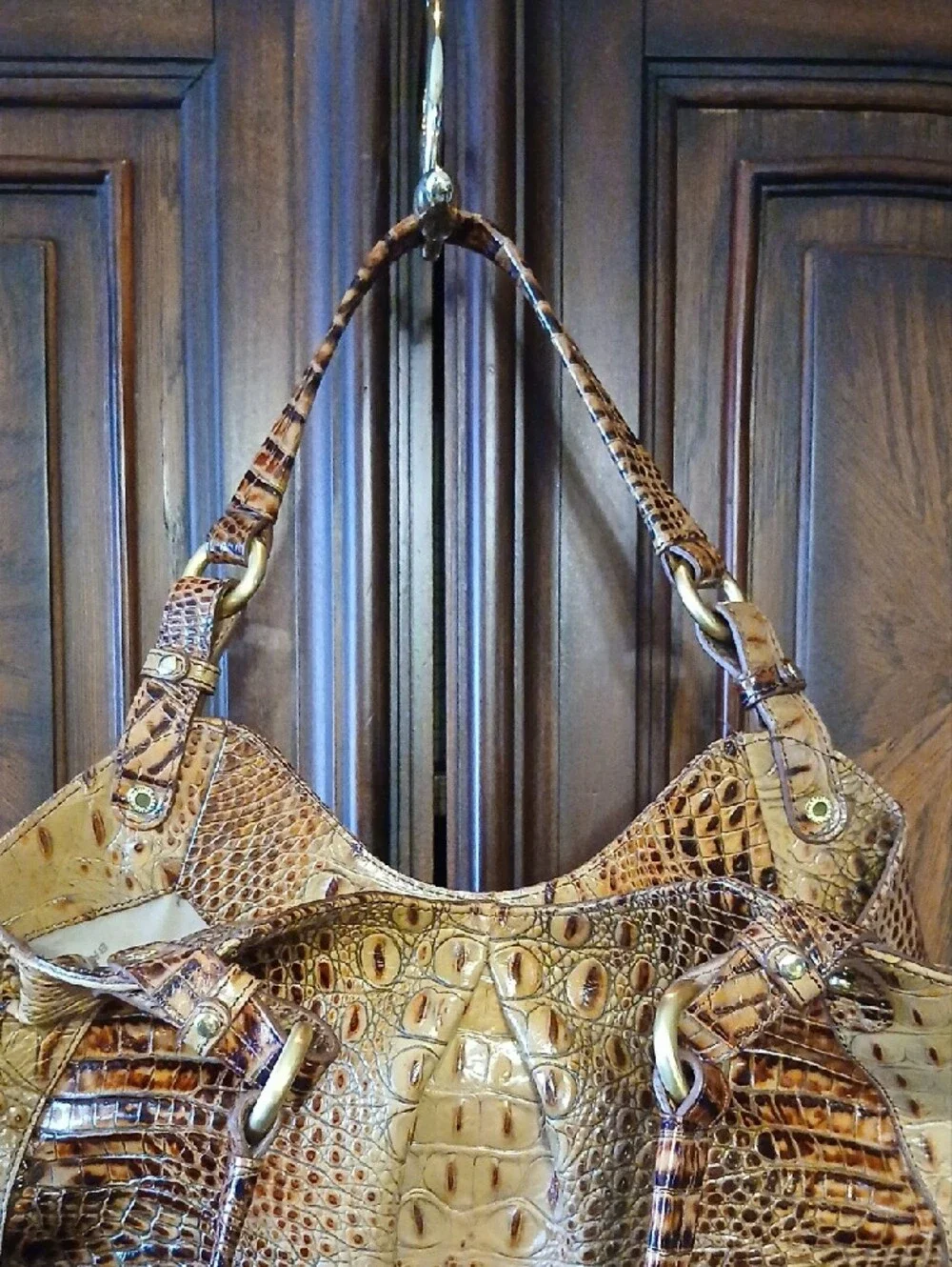 Brahmin accents strap buckle