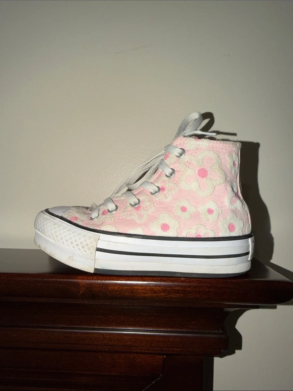 Converse 12 All Star Lift High-Top Sneakers featuring a pink white floral