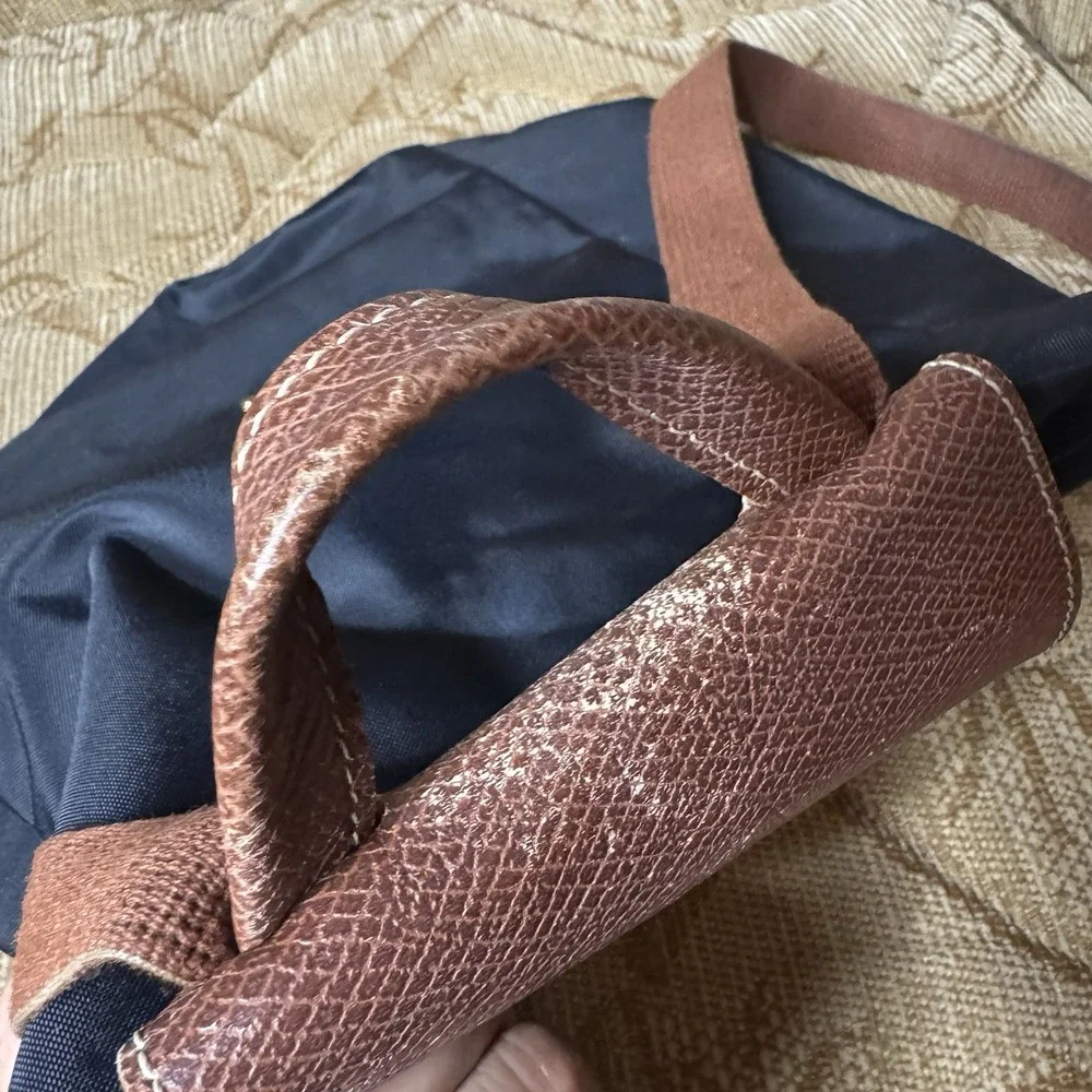 Longchamp zipper needs