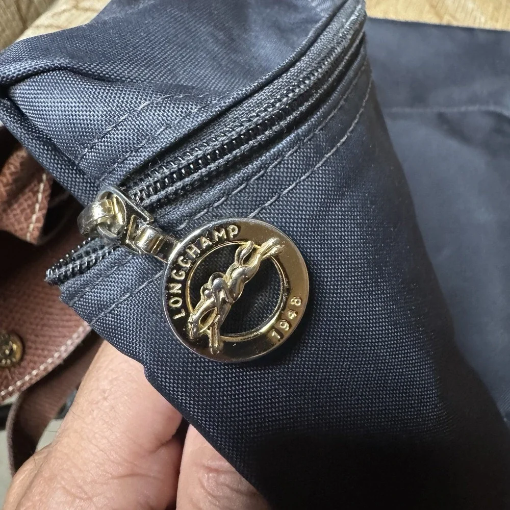 Longchamp zipper needs