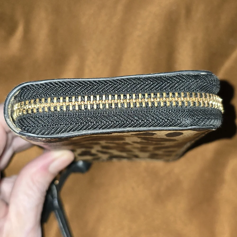 Tory Burch zipper smoke‑free ocelot