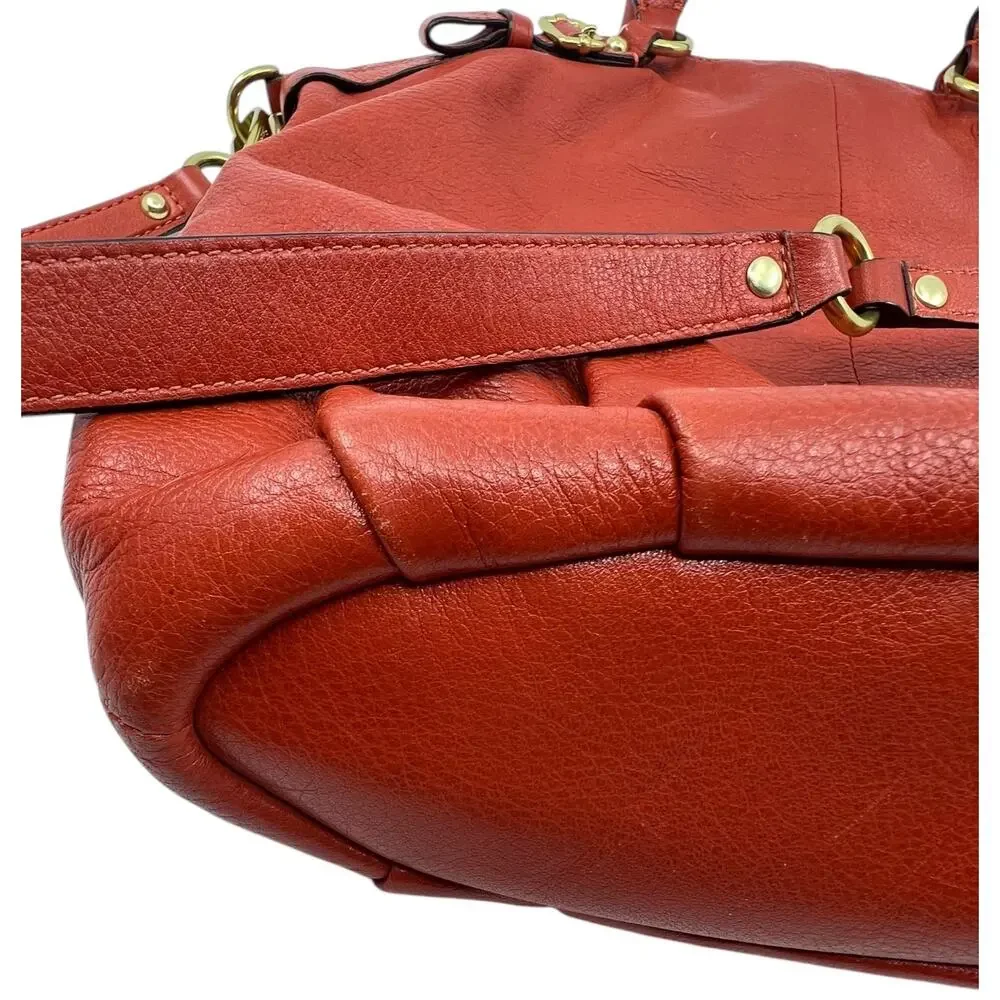Coach functions orange