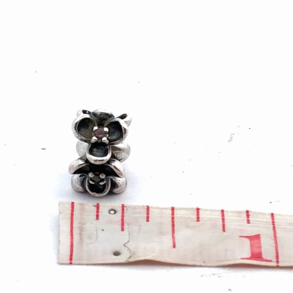 Pandora charm approximately