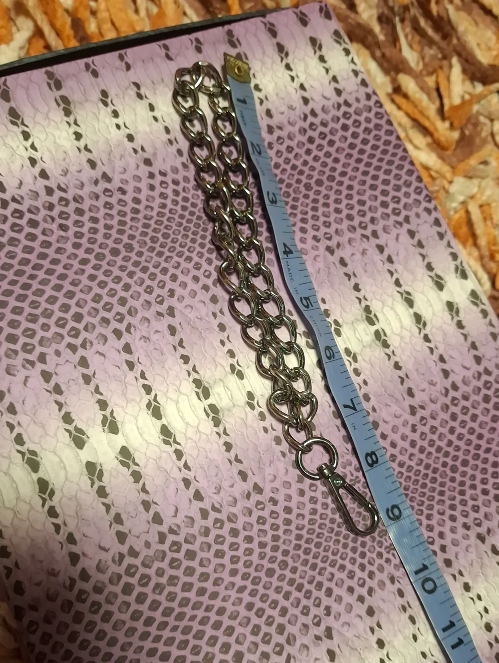 None slivertone wristlet
