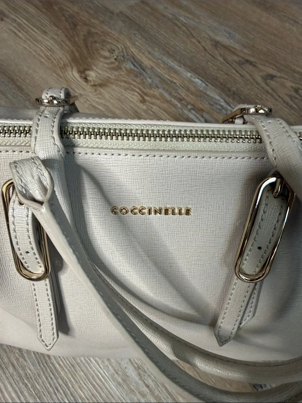 Coccinelle cream leather