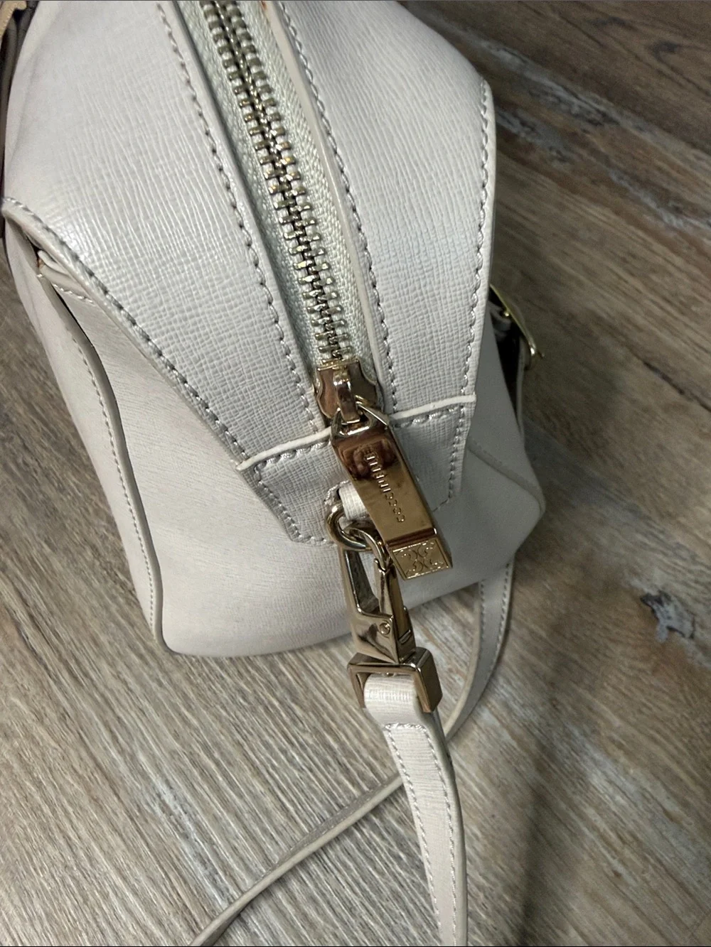 Coccinelle cream leather
