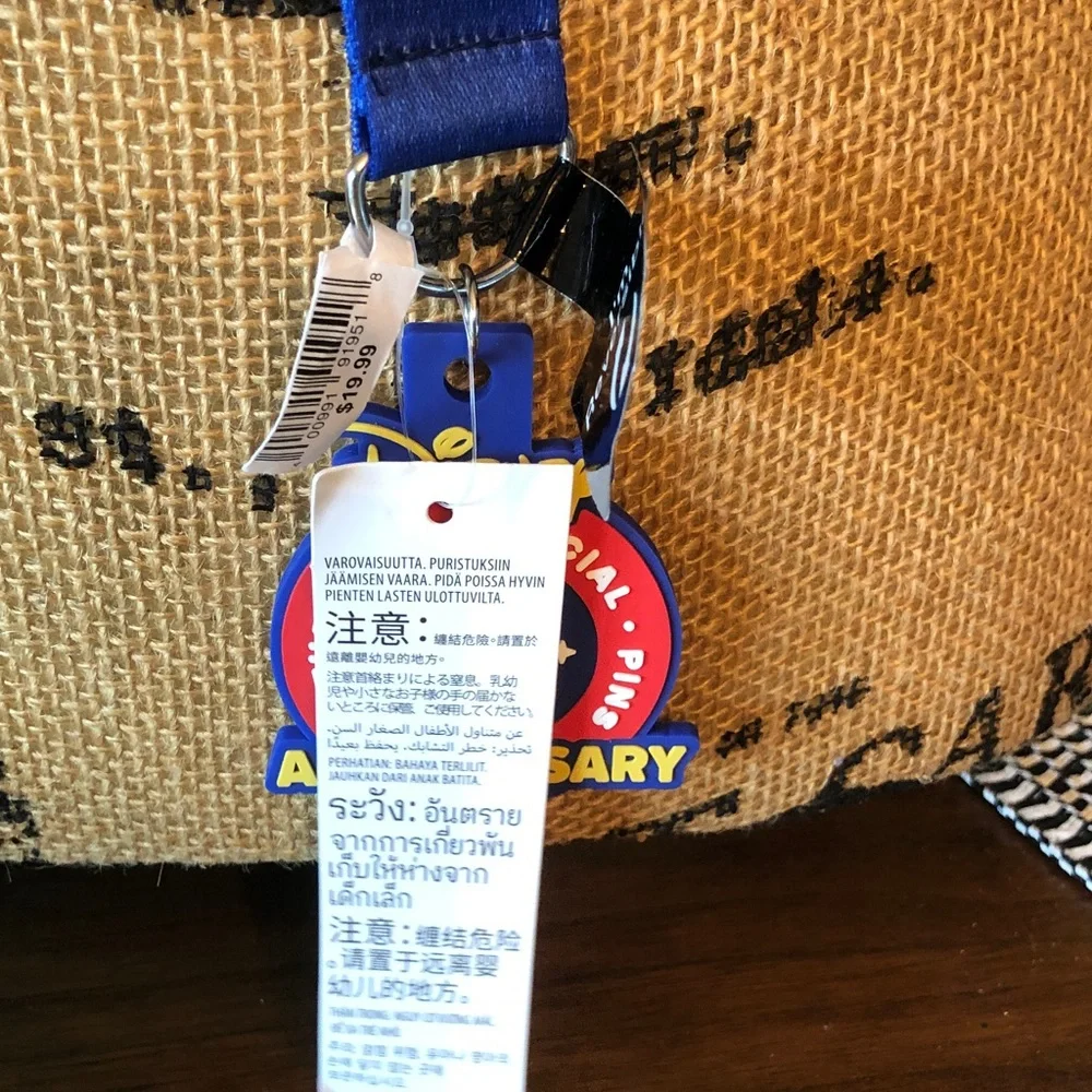 Authentic New with tag. Disney Multicolor Mickey Mouse Pin Lanyard