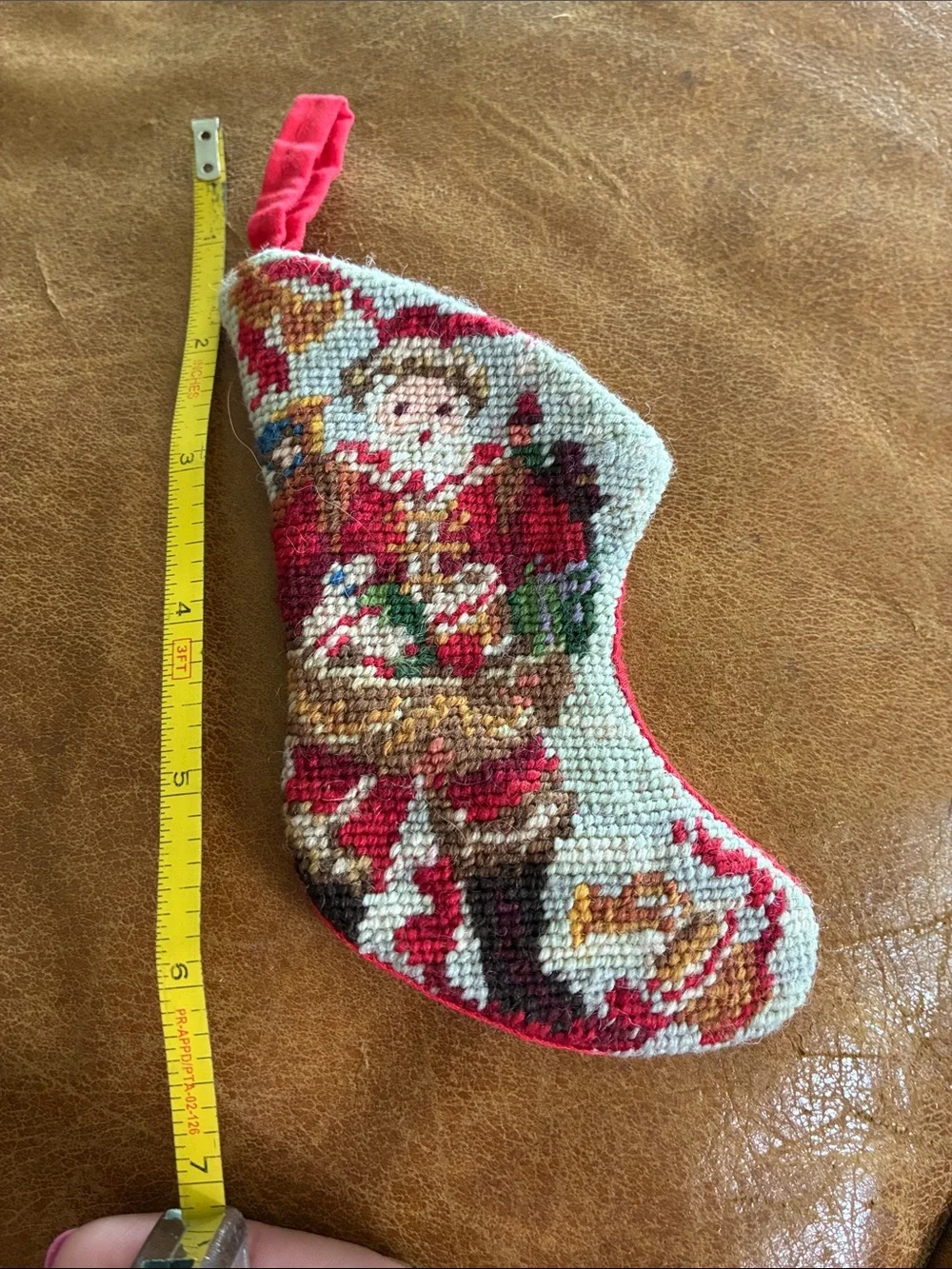 Pair of Small needle point stockings