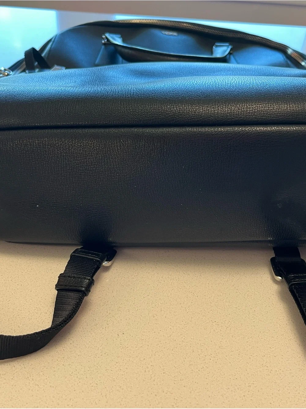 Tumi Black Leather Backpack with Silver-Tone Hardware