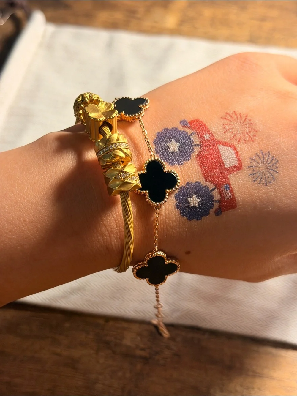 Van Cleef & Arpels Gold Bracelet with Black Alhambra Motifs