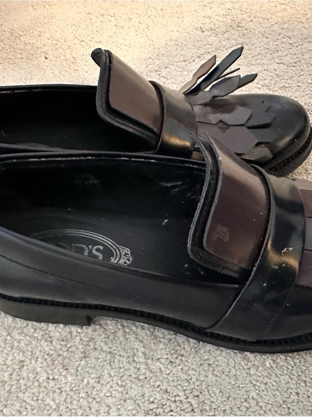 Tod's Black Leather Kiltie Penny Loafers
