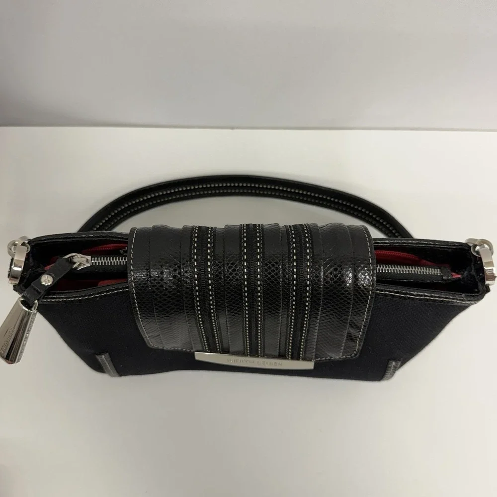 Judith Leiber pocket missing no