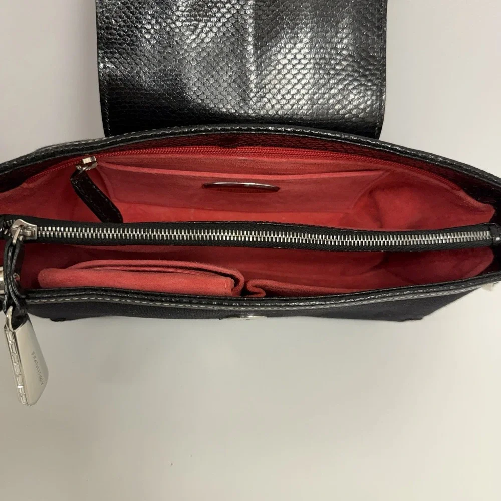 Judith Leiber suede good