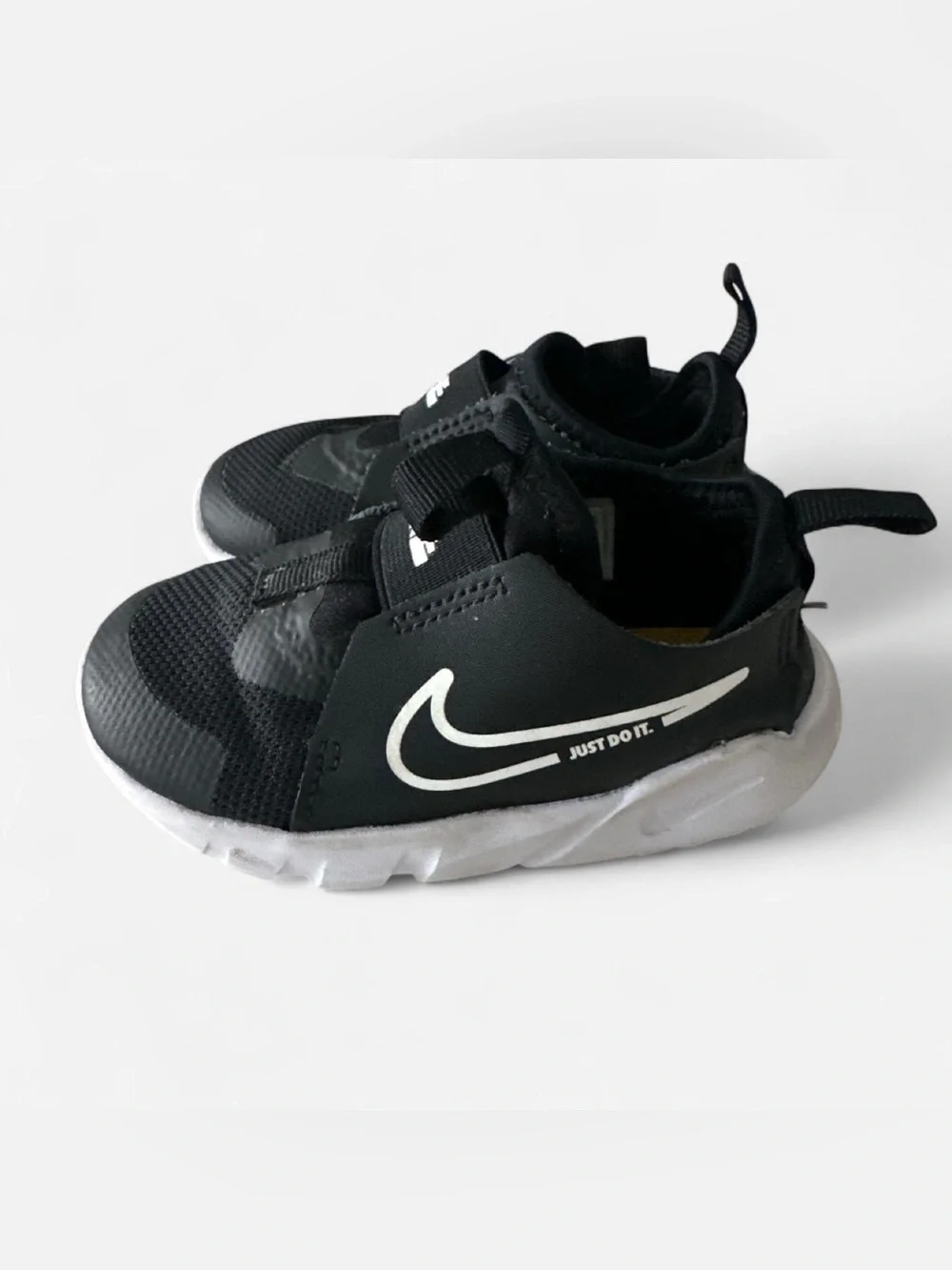 Nike Kids Black and White Slip-On Sneaker with White Swoosh