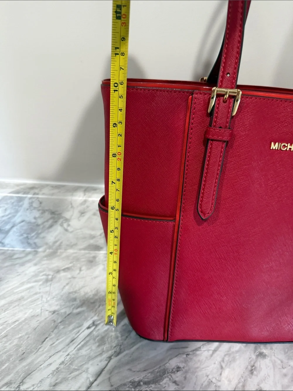 Michael Kors hardware accent gold