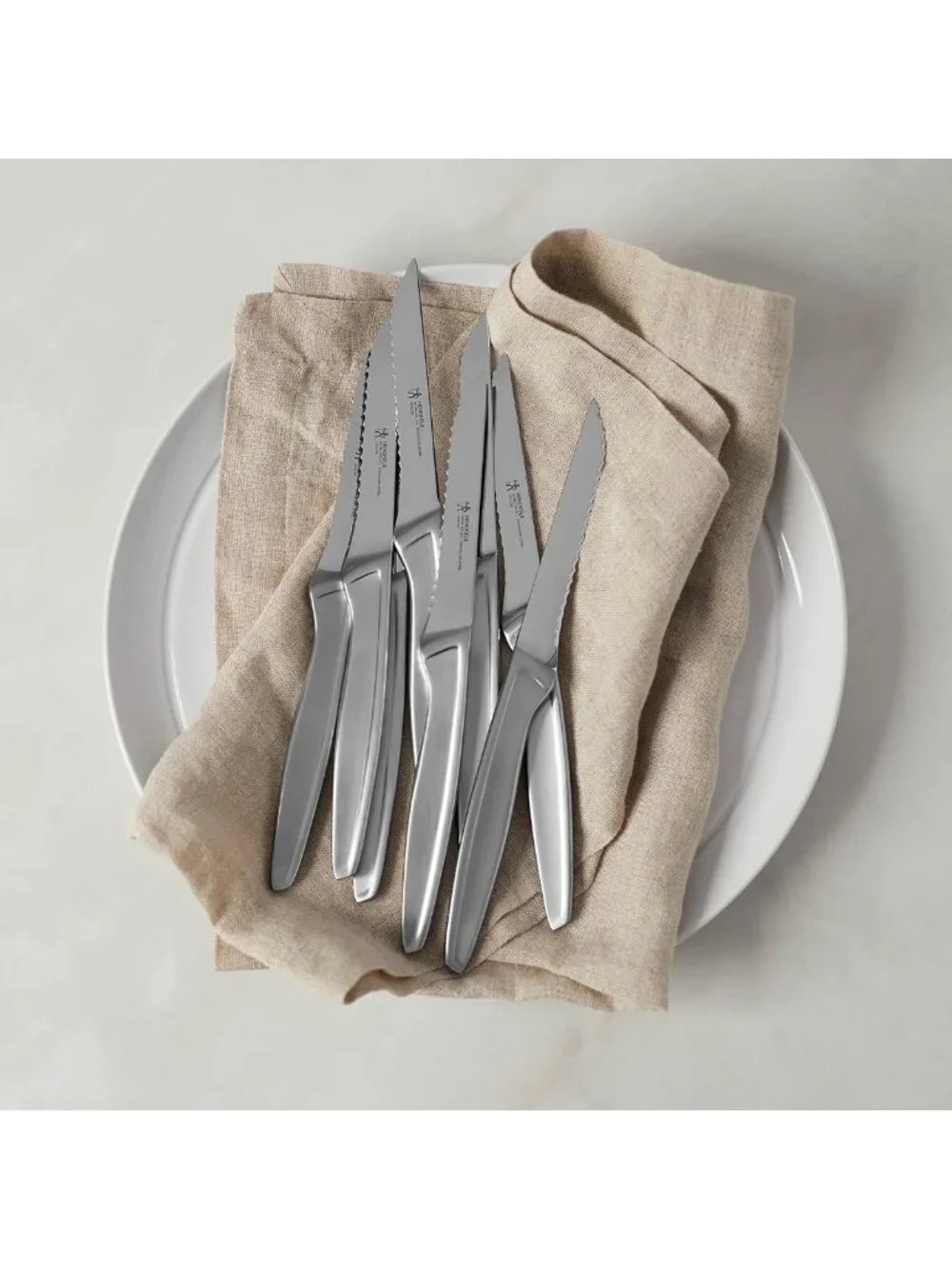 Razor-Sharp Steak Knife Set of 8 - German Engineered, Precision Cutting, Silver