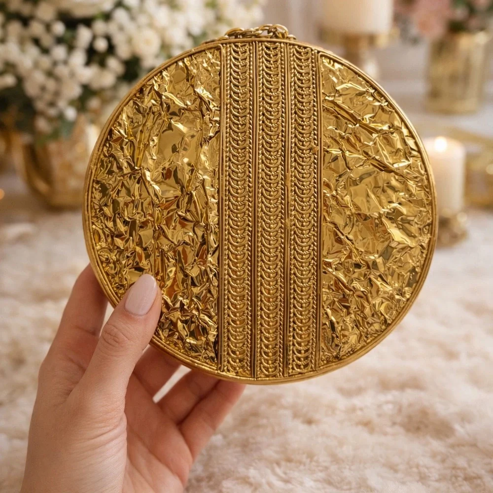 Round Gold Lion Relief Clutch
