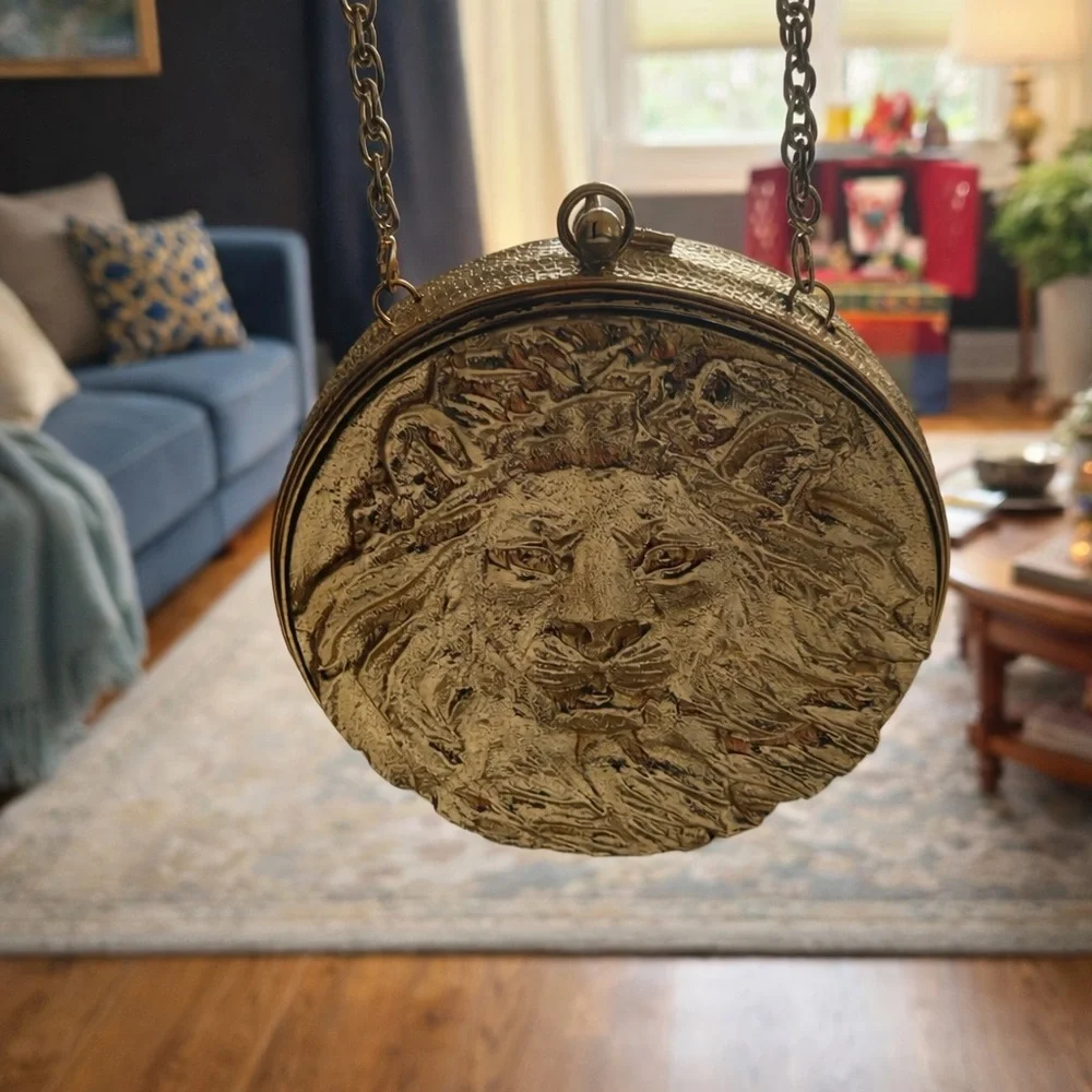Round Gold Lion Relief Clutch