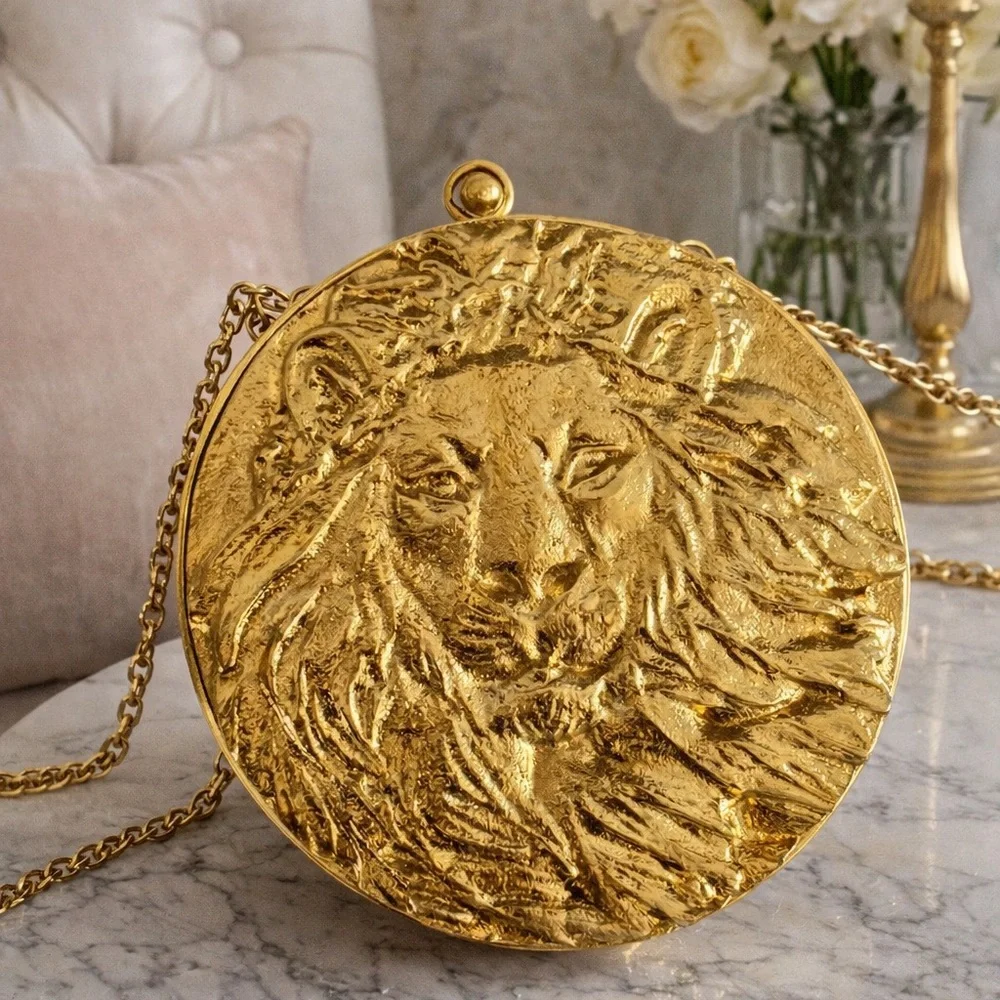 Round Gold Lion Relief Clutch